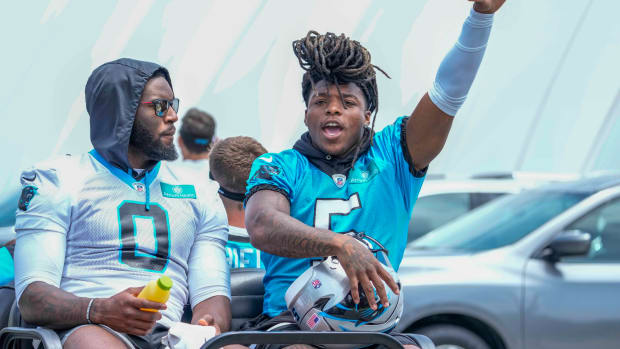 Carolina Panthers linebacker Brian Burns (0) and wide receiver Laviska Shenault Jr. (5) on the way to practice during the Carolina Panthers minicamp.